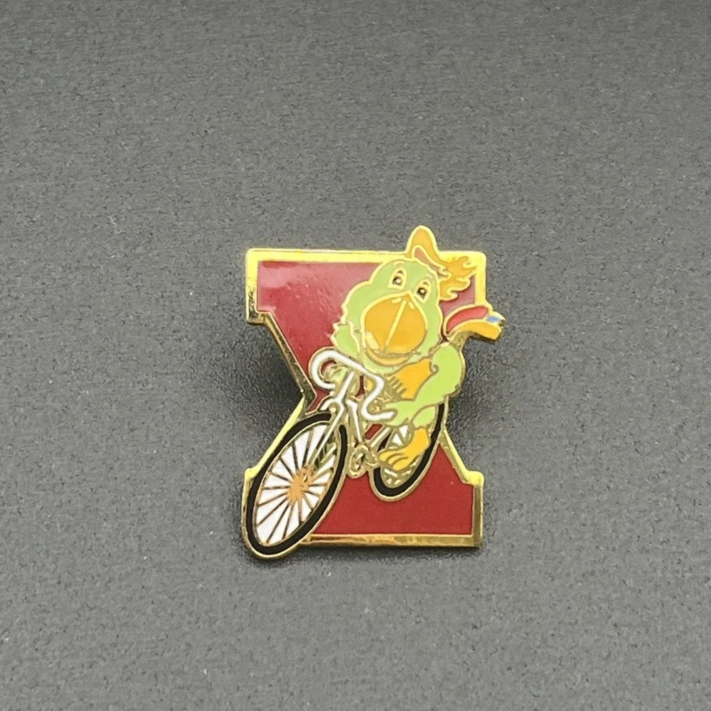 1987 Tenth Pan American Games Marsh Amigo Mascot Cycling‎ Lapel Hat Pin